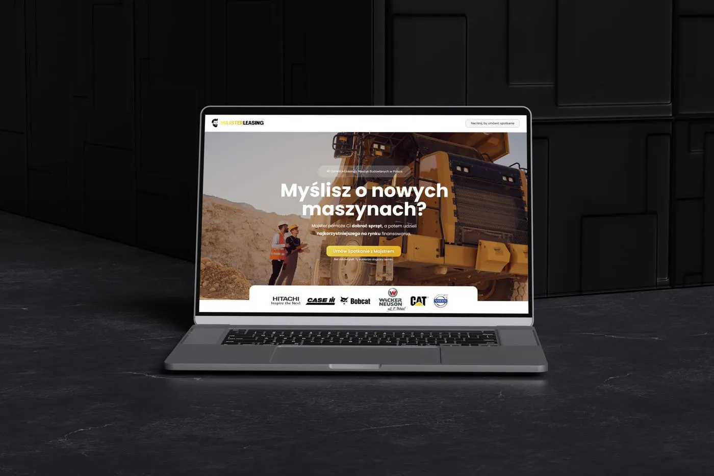 Laptop z poprzednią wersją strony Majster Leasing.